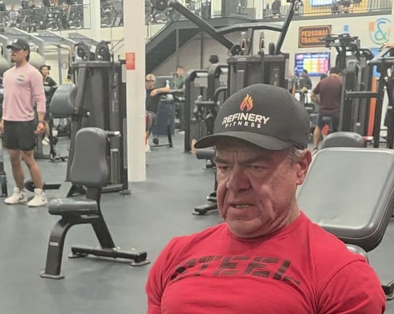 Jeff Mensing set and focused between sets on the gym floor